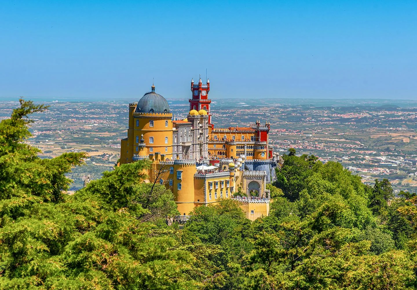 Pena Palace above the wooded Sintra hills